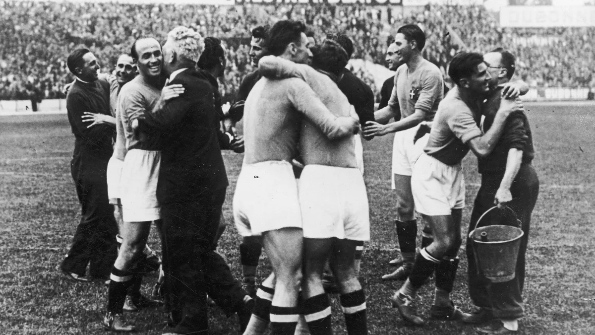 The 1938 FIFA World Cup Final — Italian players celebrating a win in a 1938 FIFA World Cup final against Hungary at Stade Olympique de Colombes in Paris.